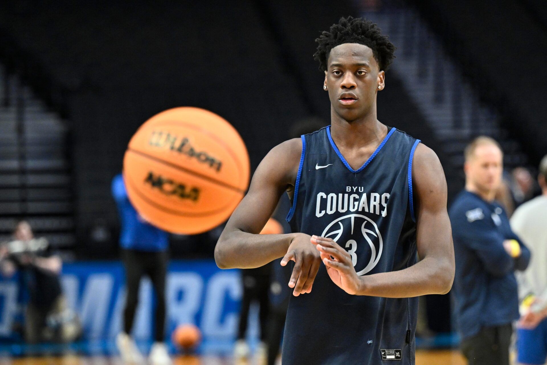 BYU Cougars forward AJ Dybantsa (3) passes the ball during a practice session ahead of the first round of the men's 2026 NCAA Tournament at Moda Center.