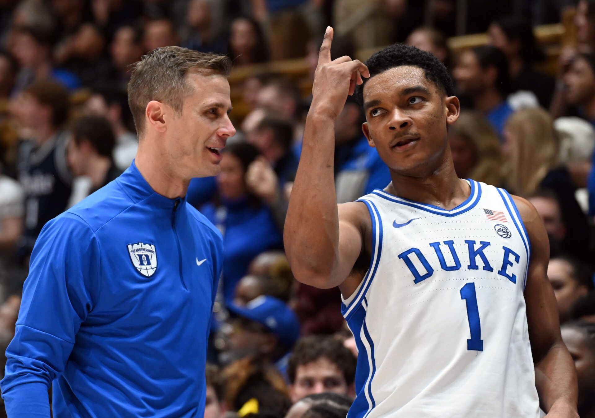 Duke Blue Devils guard Caleb Foster (1) gestures to head coach Jon Scheyer during the second half against the Virginia Cavaliers at Cameron Indoor Stadium.   Duke won 77-51.
