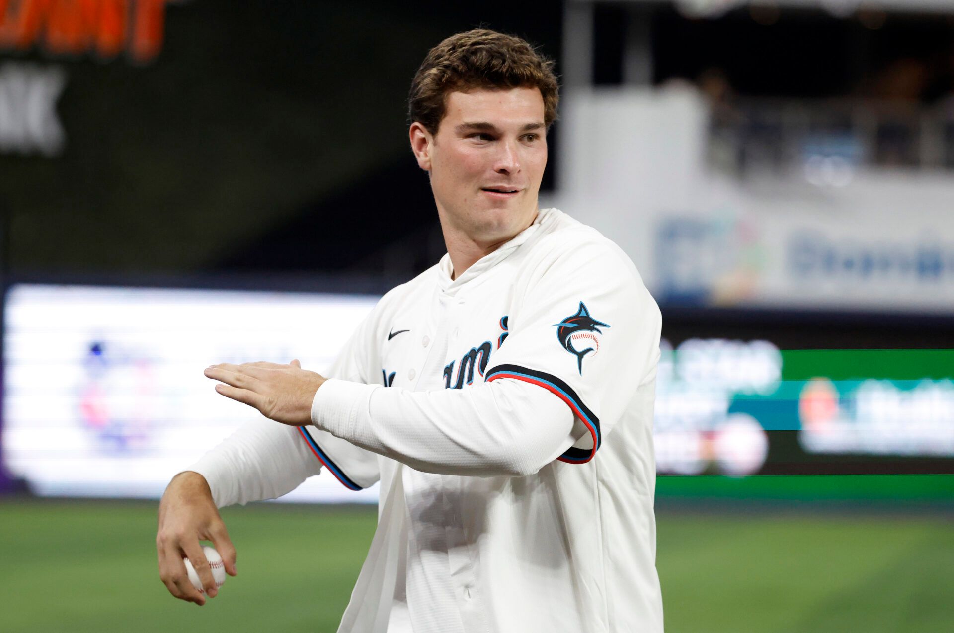 Indiana Hoosiers quarterback Fernando Mendoza throws the ceremonial first pitch before a game between the Miami Marlins and the St. Louis Cardinals at loanDepot Park.