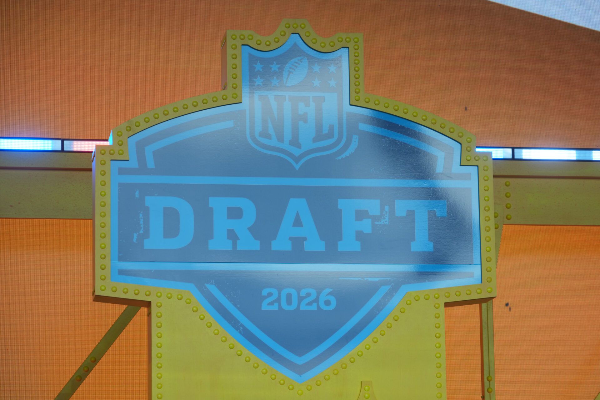 The 2026 NFL Draft logo on the Draft theater stage at Acrisure Stadium.