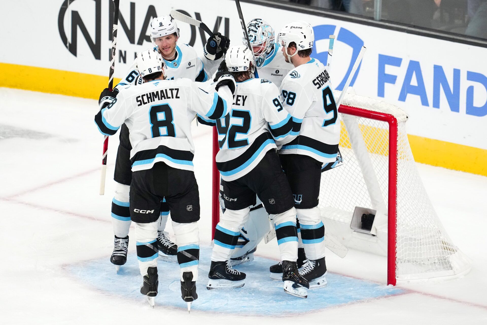 Utah Mammoth players celebrate after defeating the Vegas Golden Knights 3-2 in game two of the first round of the 2026 Stanley Cup Playoffs at T-Mobile Arena.