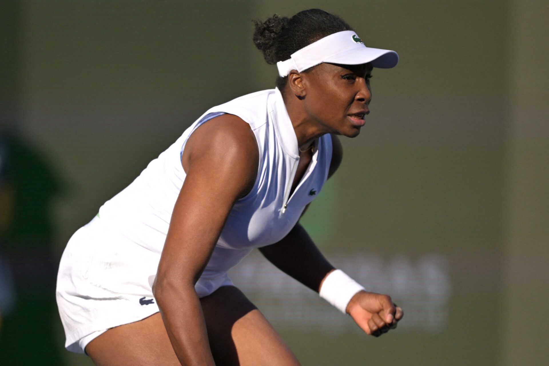 Venus Williams (USA) reacts during her first round match against Diane Parry (FRA) during the BNP Paribas Open at the Indian Wells Tennis Garden.