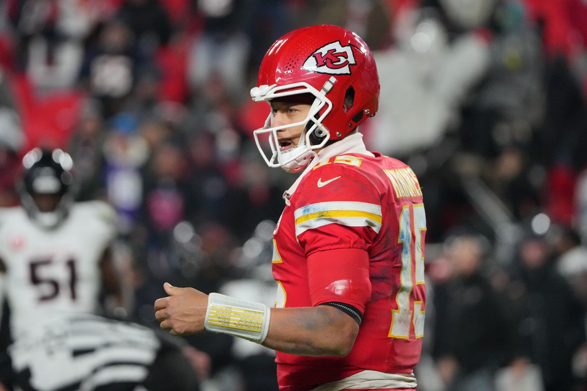 Kansas City Chiefs quarterback Patrick Mahomes (15) looks to the sideline during the fourth quarter against the Houston Texans at GEHA Field at Arrowhead Stadium.