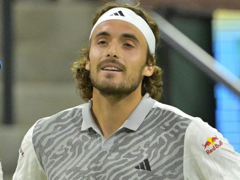 Paula Badosa and Stefanos Tsitsipas watch the action in the Eisenhower Cup Tie Break Tens event featuring mixed doubles during the BNP Paribas Open at the Indian Wells Tennis Garden.