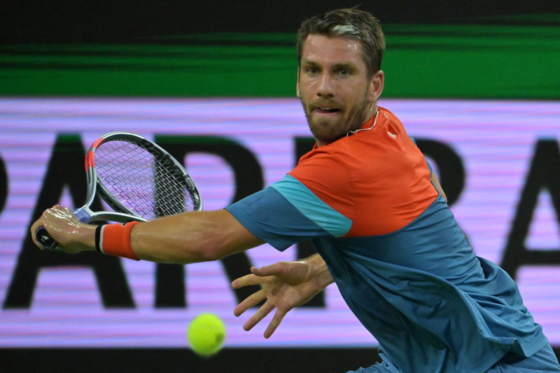 Cameron Norrie (GBR) hits a shot during his quarterfinal match Carlos Alcaraz (ESP) in the BNP Paribas Open at the Indian Wells Tennis Garden.