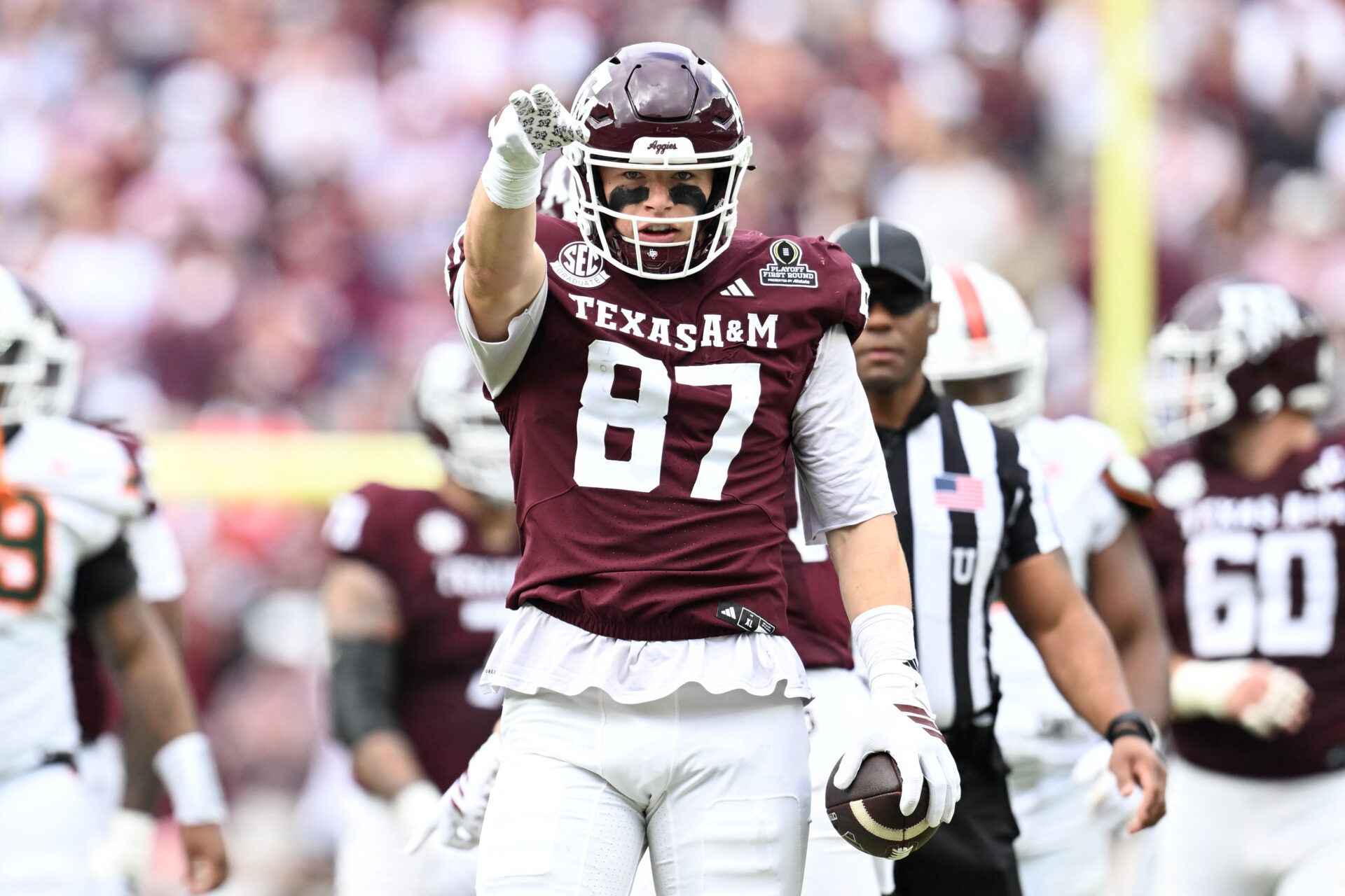 Texas A&M Aggies tight end Nate Boerkircher (87) celebrates a first down against the Miami Hurricanes during first quarter of the first round game of the CFP National Playoff at Kyle Field.