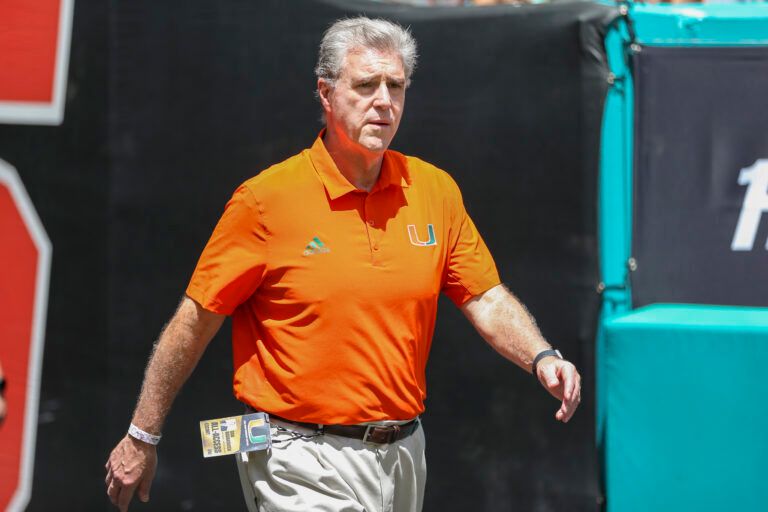 University of Miami Athletic Director Dan Radakovich walks on the field prior to the game against Bethune Cookman Wildcats at Hard Rock Stadium.
