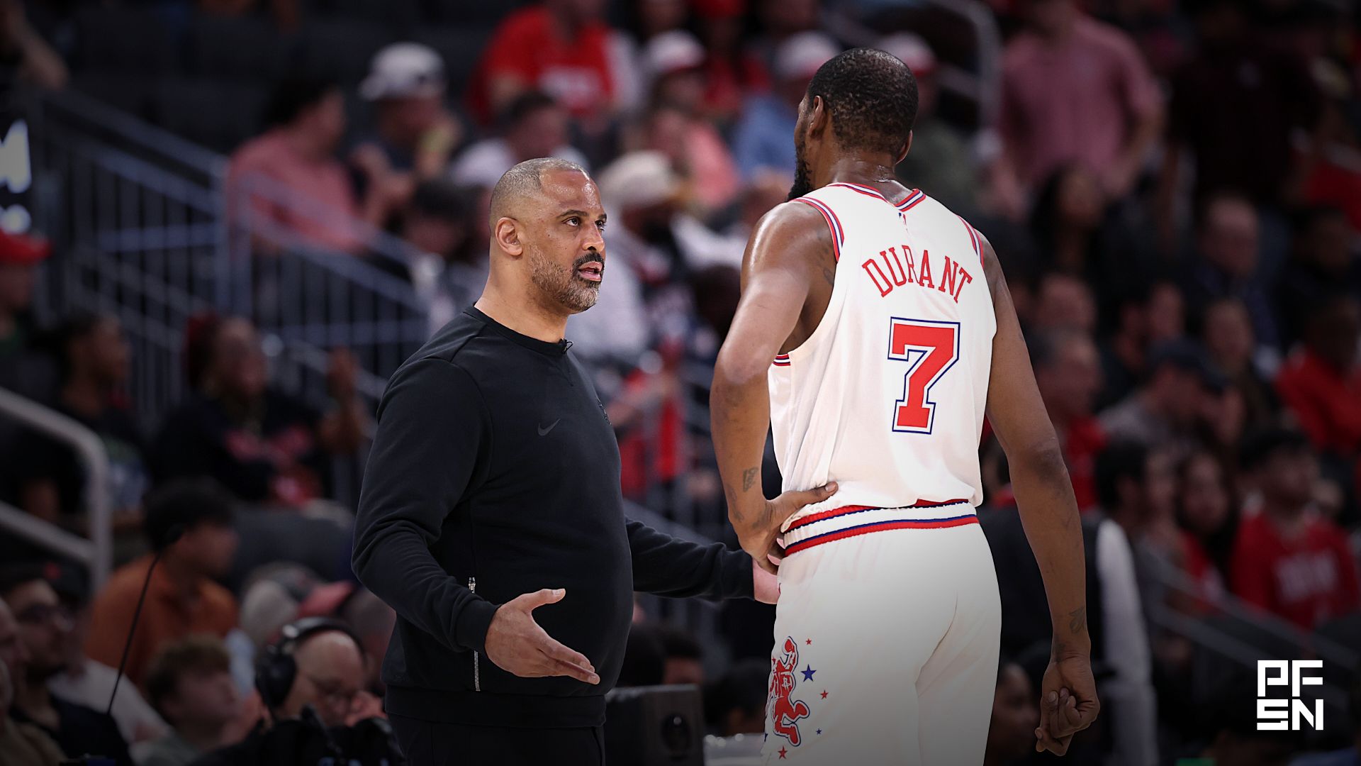 Houston Rockets Head Coach Ime Udoka talks with forward Kevin Durant (7) during the first half against the Minnesota Timberwolves at Toyota Center.