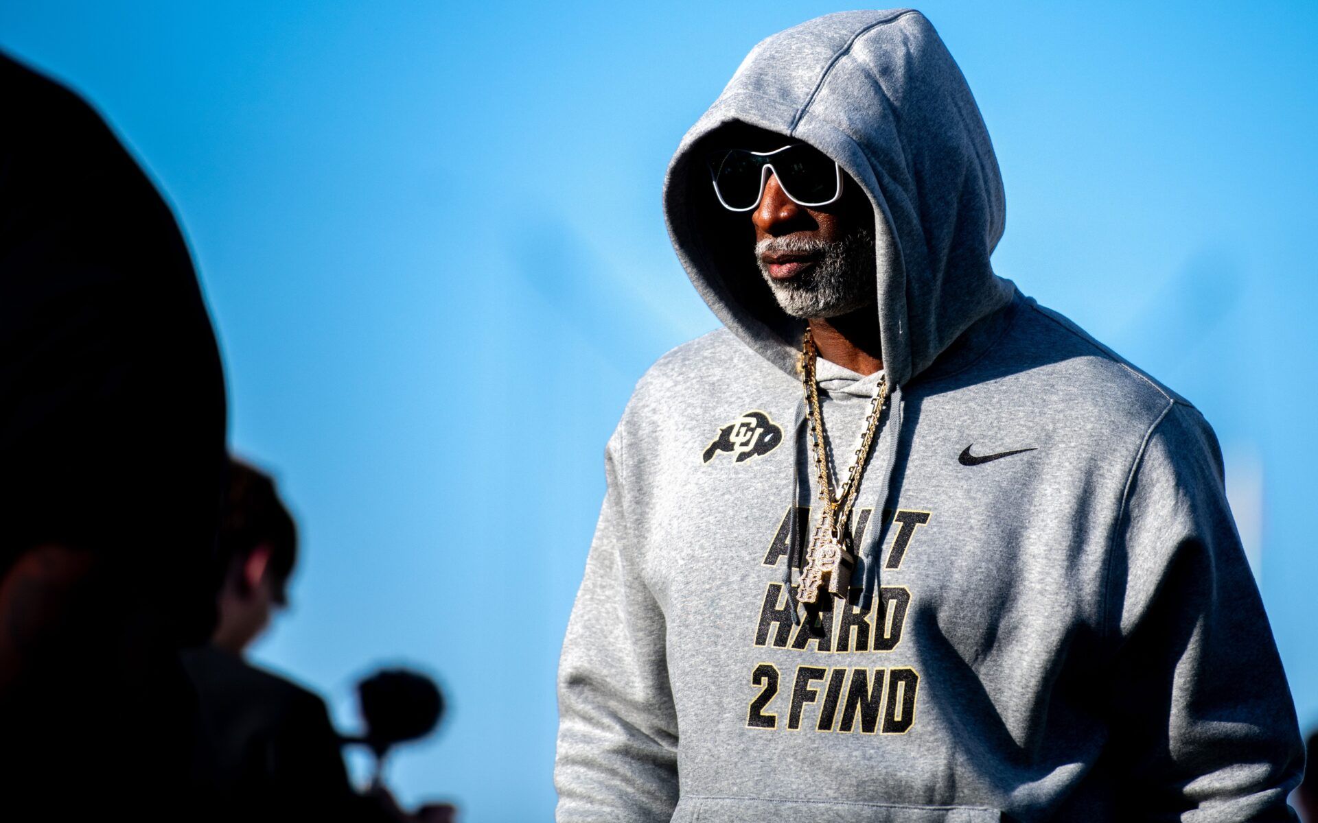 CU football head coach Deion Sanders, or Coach Prime, watches his team warm up before the game against CSU in the Rocky Mountain Showdown at Canvas Stadium on Saturday, Sept. 14, 2024, in Fort Collins, Colo.