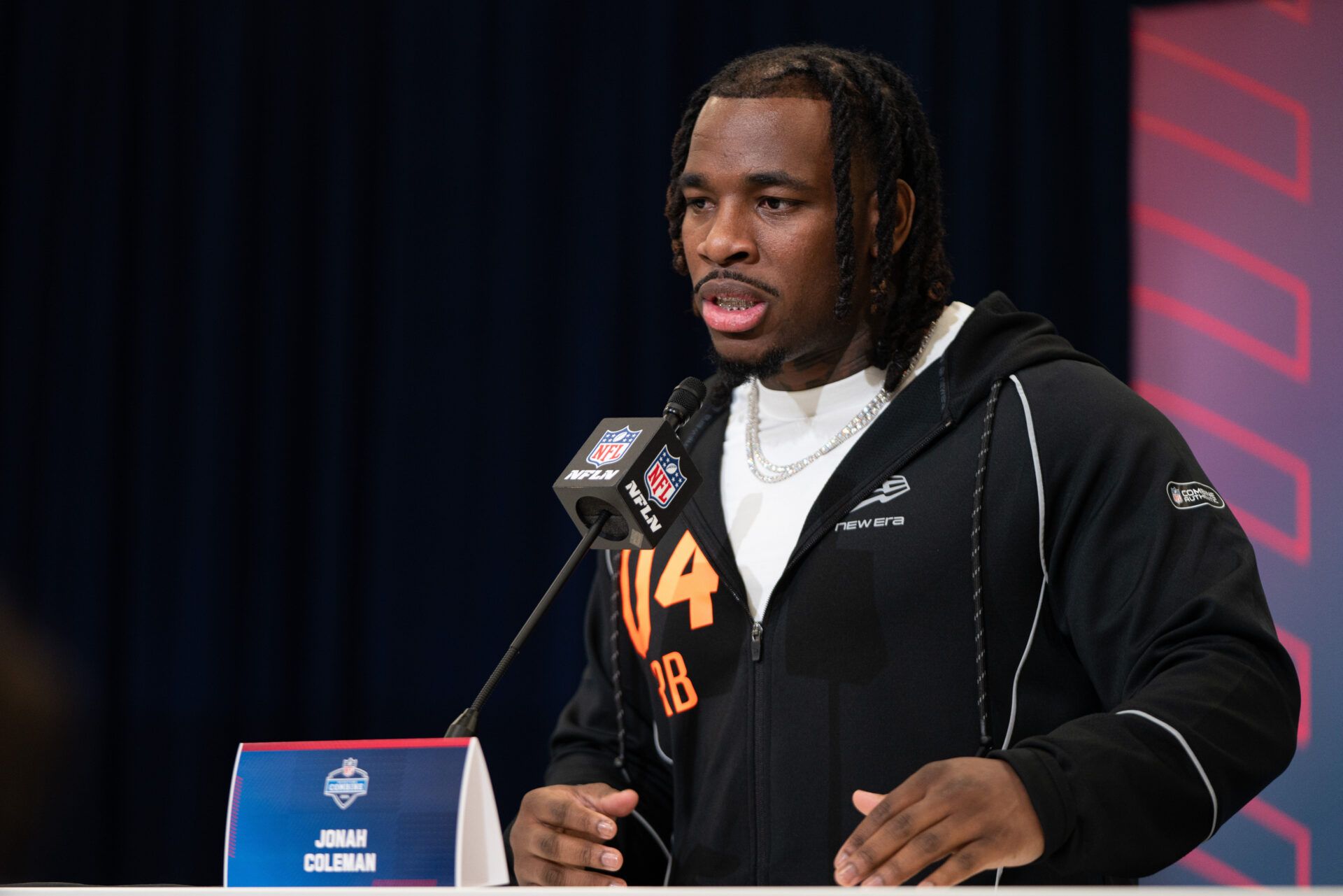 Washington running back Jonah Coleman (RB04) speaks to members of the media during the NFL Combine at the Indiana Convention Center.