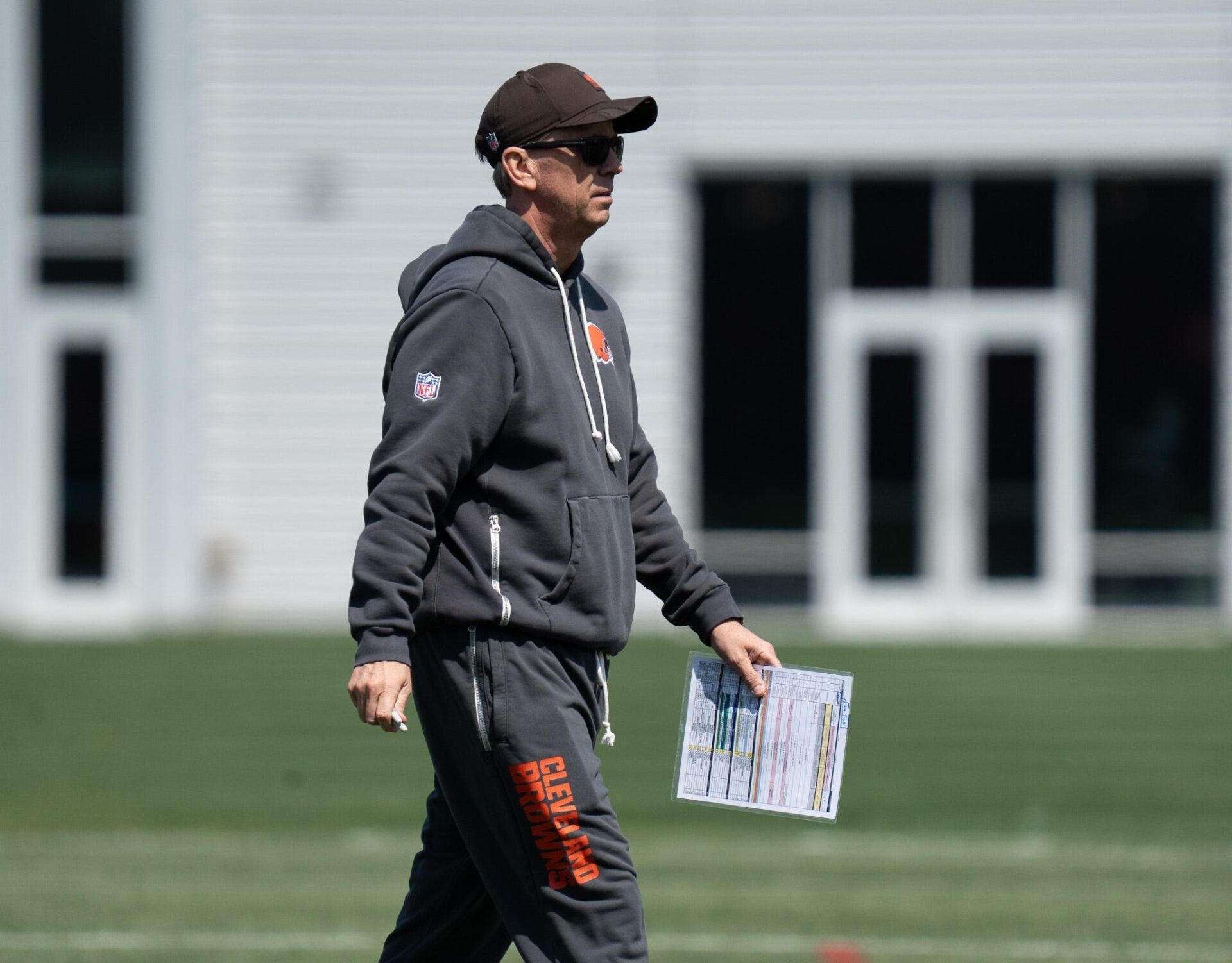 Coach Todd Monken walks through groups of players as they train at the Browns mini camp in Berea on April 21, 2026.
