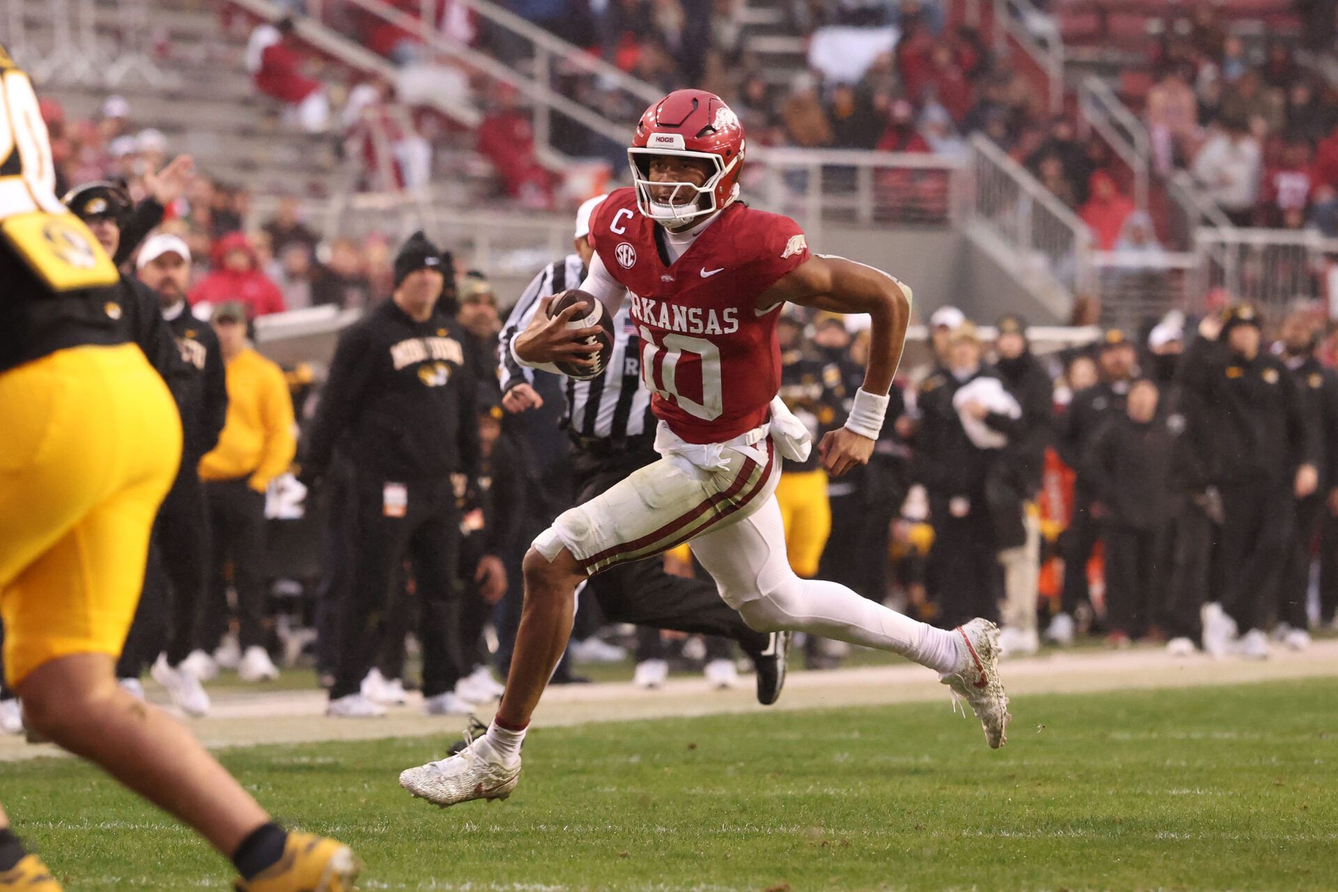 Arkansas Razorbacks quarterback Taylen Green (10) rushes during the second quarter against the Missouri Tigers at Donald W. Reynolds Razorback Stadium.