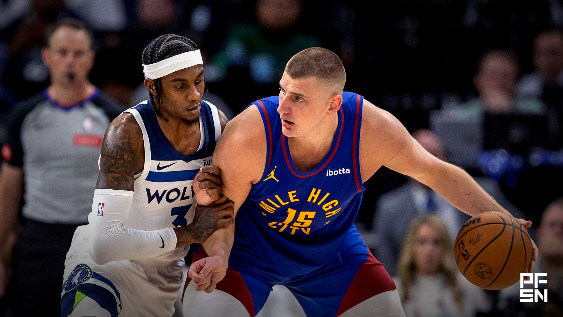 Denver Nuggets center Nikola Jokic (15) controls the ball as Minnesota Timberwolves forward Jaden McDaniels (3) defends in the second half during game three of the second round for the 2024 NBA playoffs at Target Center.