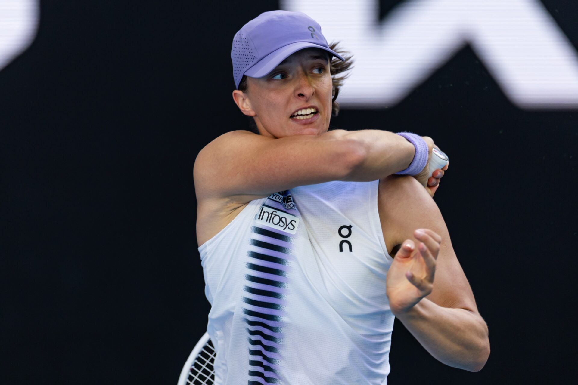 Iga Swiatek of Poland in action against Marie Bouzkova of Czech Republic in the second round of the womens singles at the Australian Open at John Cain Arena in Melbourne Park.
