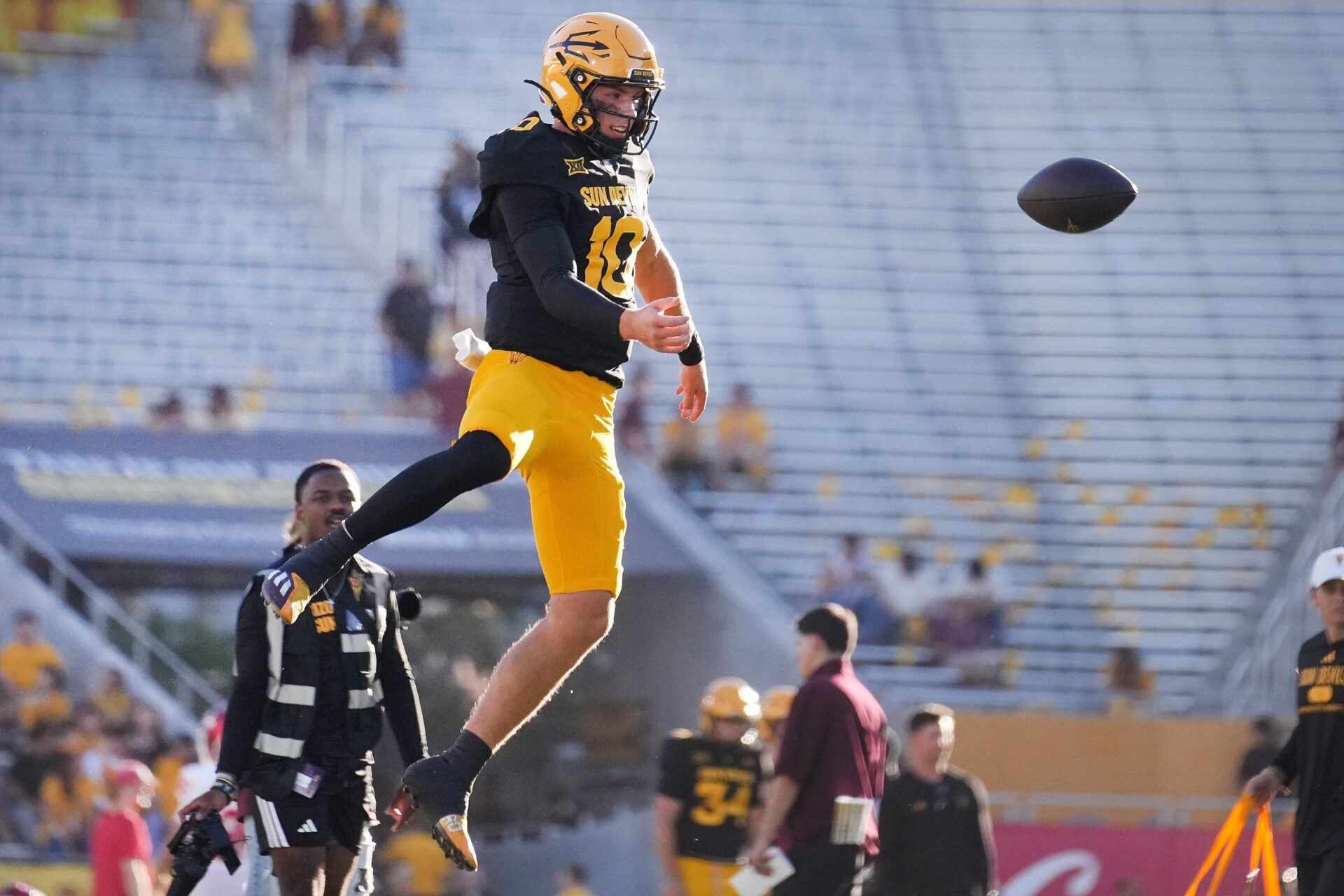 ASU Sun Devils quarterback Sam Leavitt (10) warms up before the game against the Houston Cougars at Mountain America Stadium in Tempe on Oct. 25, 2025.