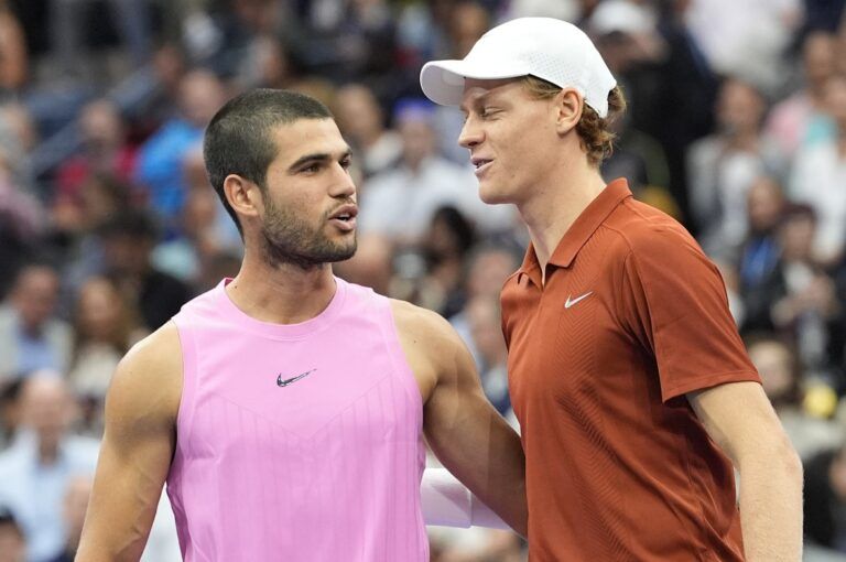 Carlos Alcaraz (ESP) and Jannik Sinner (ITA) pose for a photos a the net prior to the final of mens singles at Billie Jean King National Tennis Center.