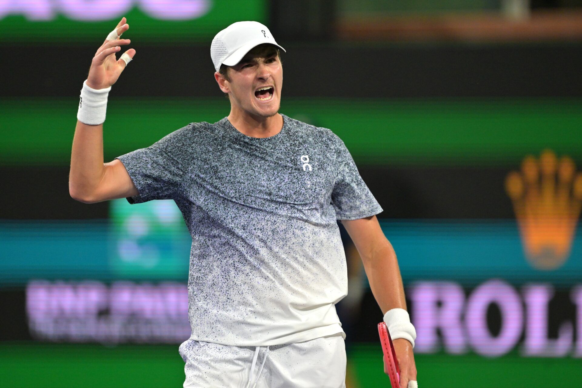 Joao Fonseca (BRA) reacts after a point during his the fourth round against Jannik Sinner (ITA) in the BNP Paribas Open at the Indian Wells Tennis Garden.