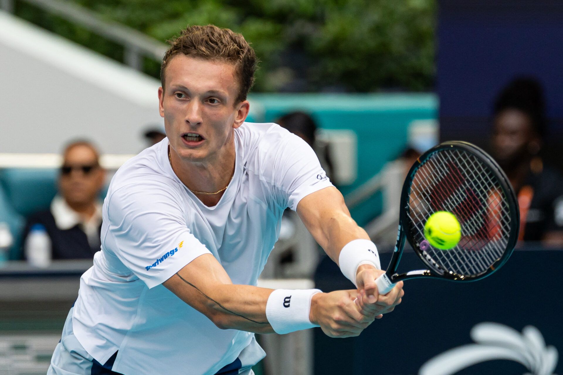 Jiri Lehecka of the Czech Republic hits a backhand against Jannik Sinner of Italy during the final of the men’s singles final of the Miami Open at the Hard Rock Stadium.