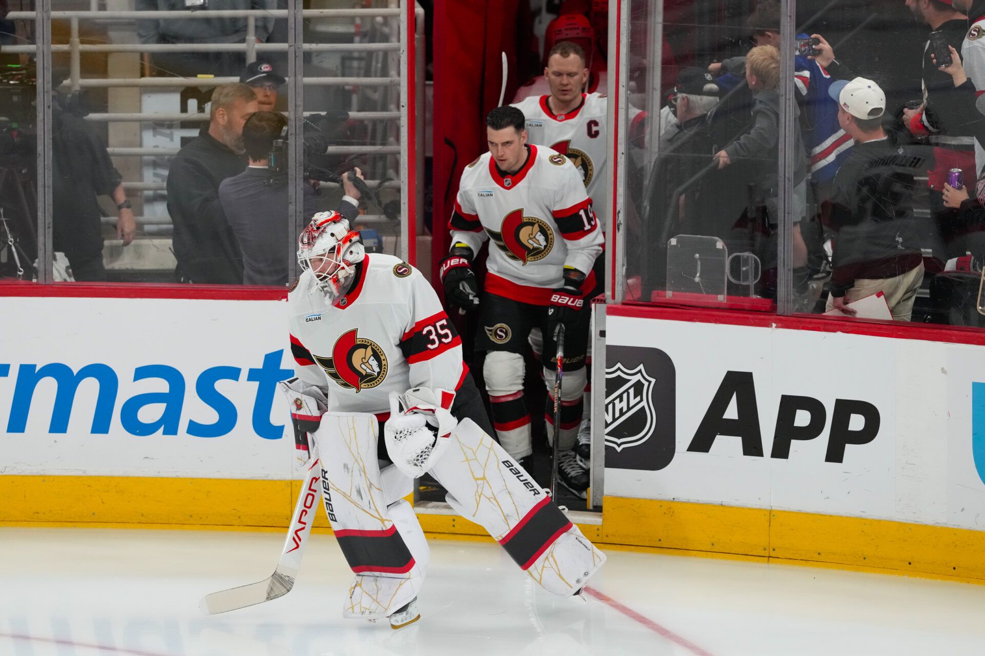 Ottawa Senators goaltender Linus Ullmark (35), right wing Drake Batherson (19) and left wing Brady Tkachuk (7) come out onto the ice for the warmups before the game against the Carolina Hurricanes  in game two of the first round of the 2026 Stanley Cup Playoffs at Lenovo Center.