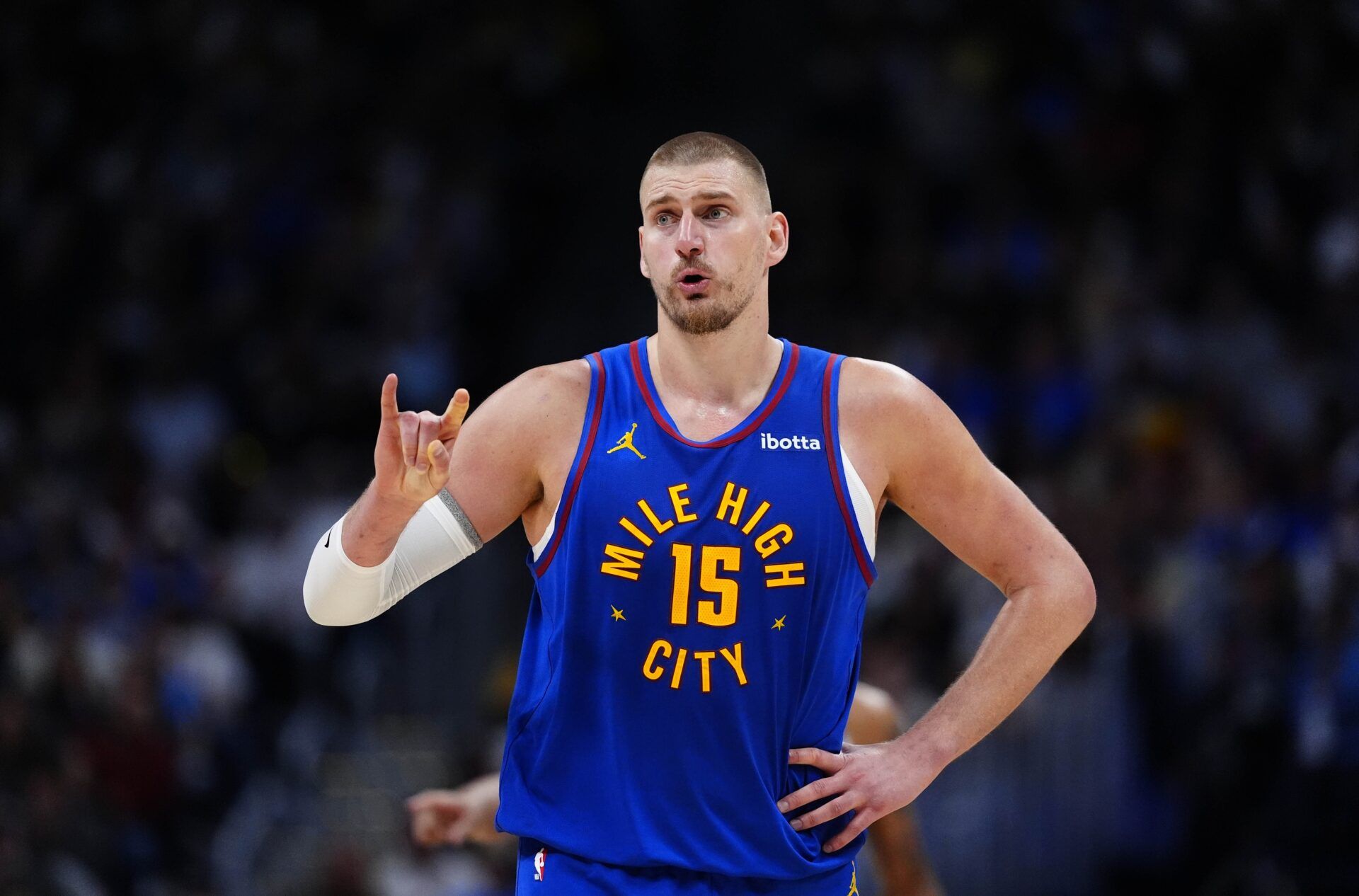 Denver Nuggets center Nikola Jokic (15) reacts towards the bench in the second half against the Minnesota Timberwolves during game two of the first round of the 2026 NBA Playoffs at Ball Arena.
