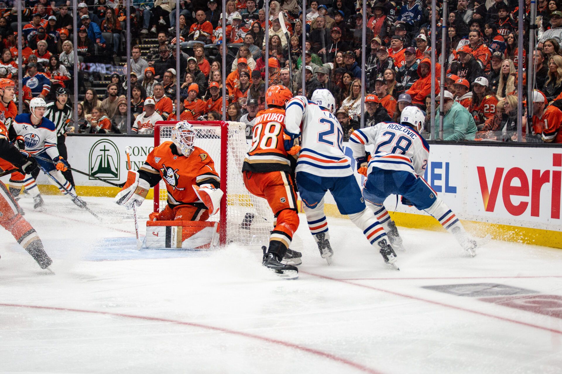 Edmonton Oilers and Anaheim Ducks contend for the puck during the third period in game four of the first round of the 2026 Stanley Cup Playoffs at Honda Center.