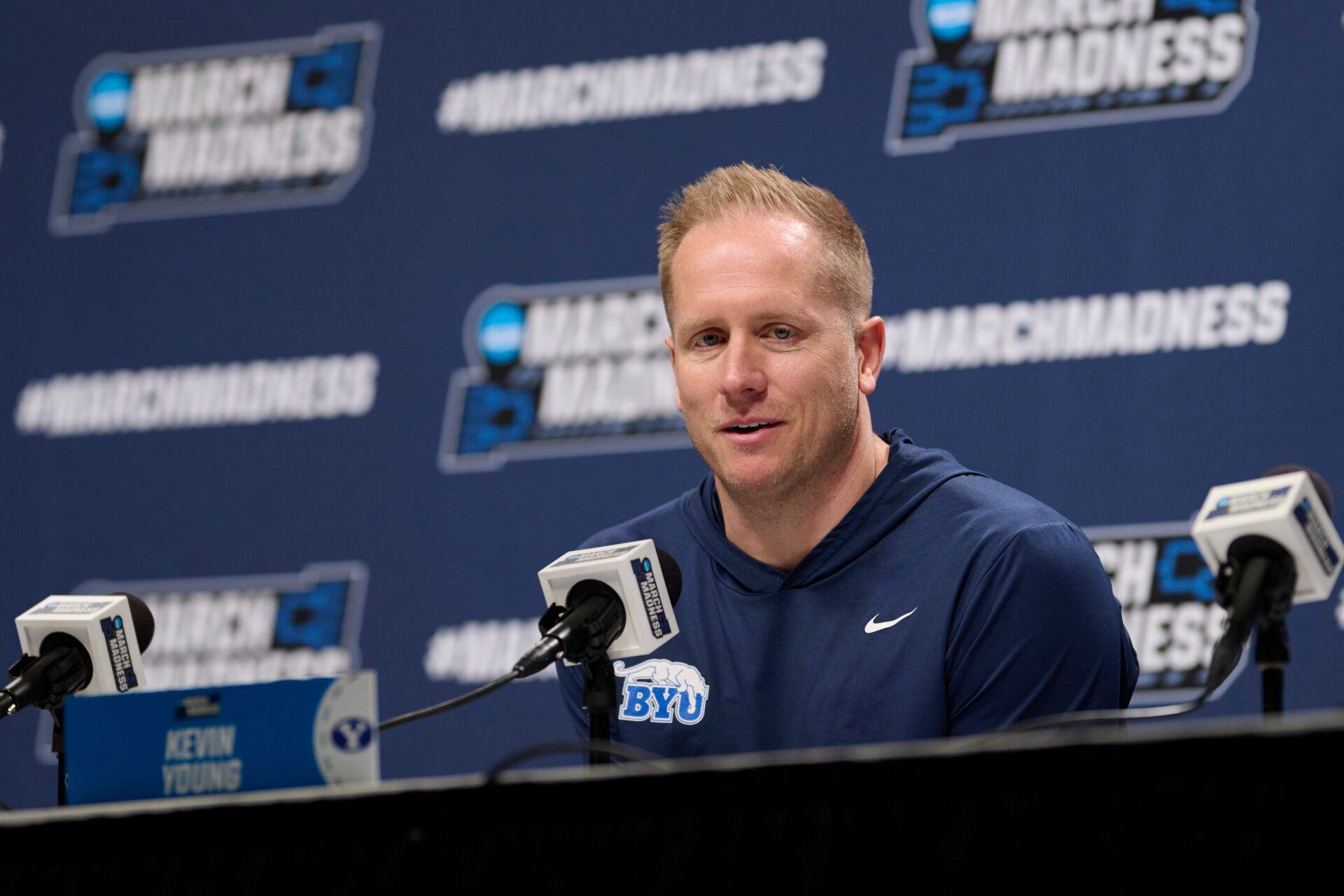 BYU Cougars head coach Kevin Young answers questions during a press conference before a practice session ahead of the first round of the men's 2026 NCAA Tournament at Moda Center.