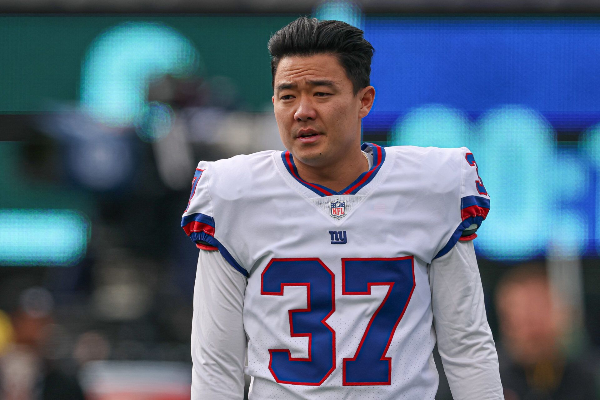 New York Giants place kicker Younghoe Koo (37) on the field before the game against the Green Bay Packers at MetLife Stadium.