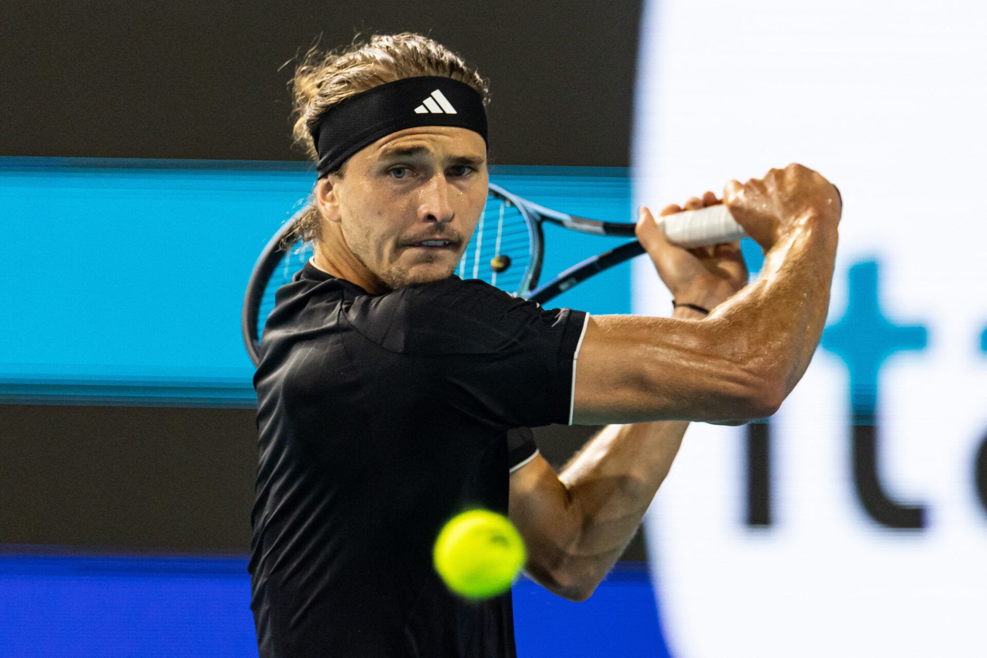 Alexander Zverev of Germany hits a backhand against Jannik Sinner of Italy in the semi-finals of the men’s singles at the Miami Open at the Hard Rock Stadium.