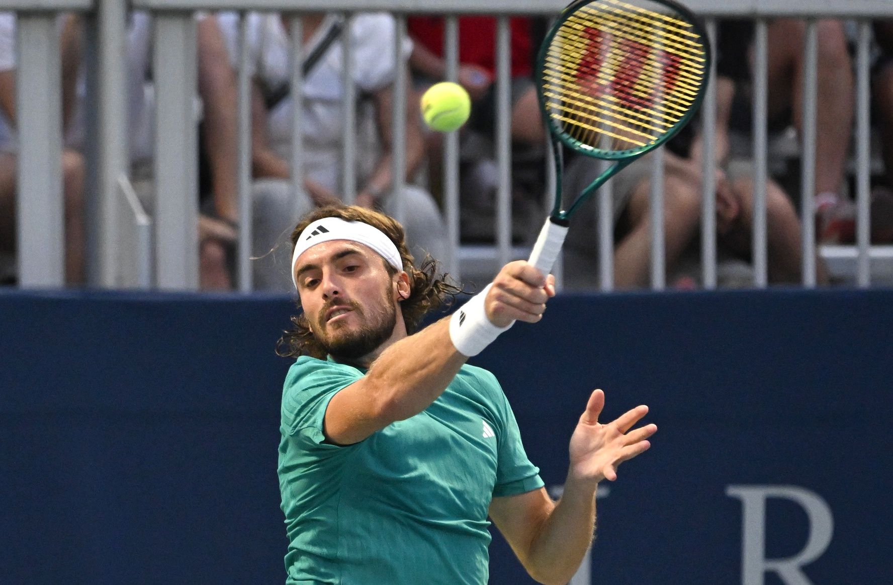 Stefanos Tsitsipas (GRE) plays a shot against Christopher O'Connell (AUS) during second round play at Sobeys Stadium.