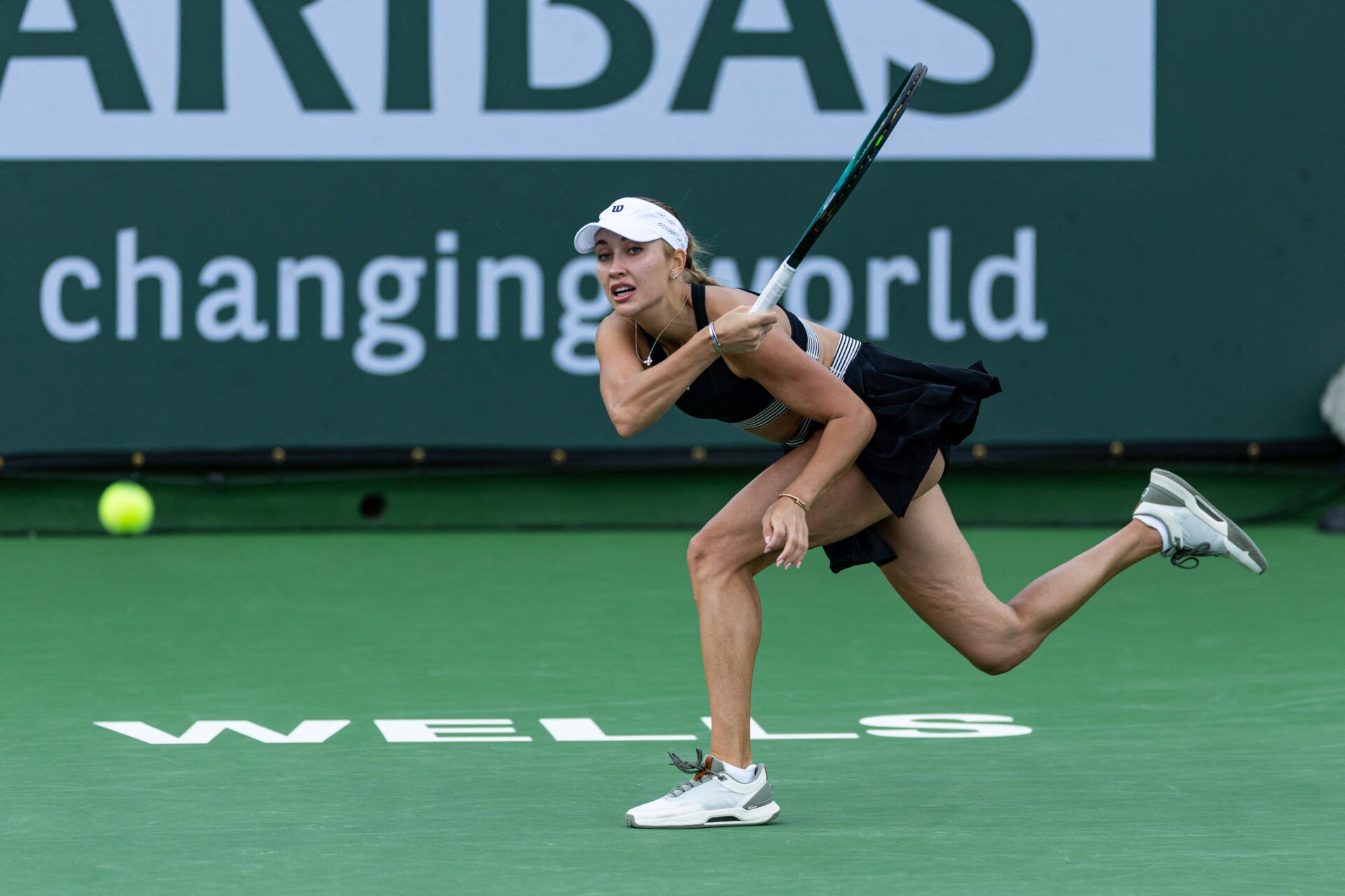 Anastasia Potapova of Austria in action against Jasmine Paolini of Italy in the second round of the women’s singles at the BNP Paribas Open at the Indian Wells Tennis Garden.