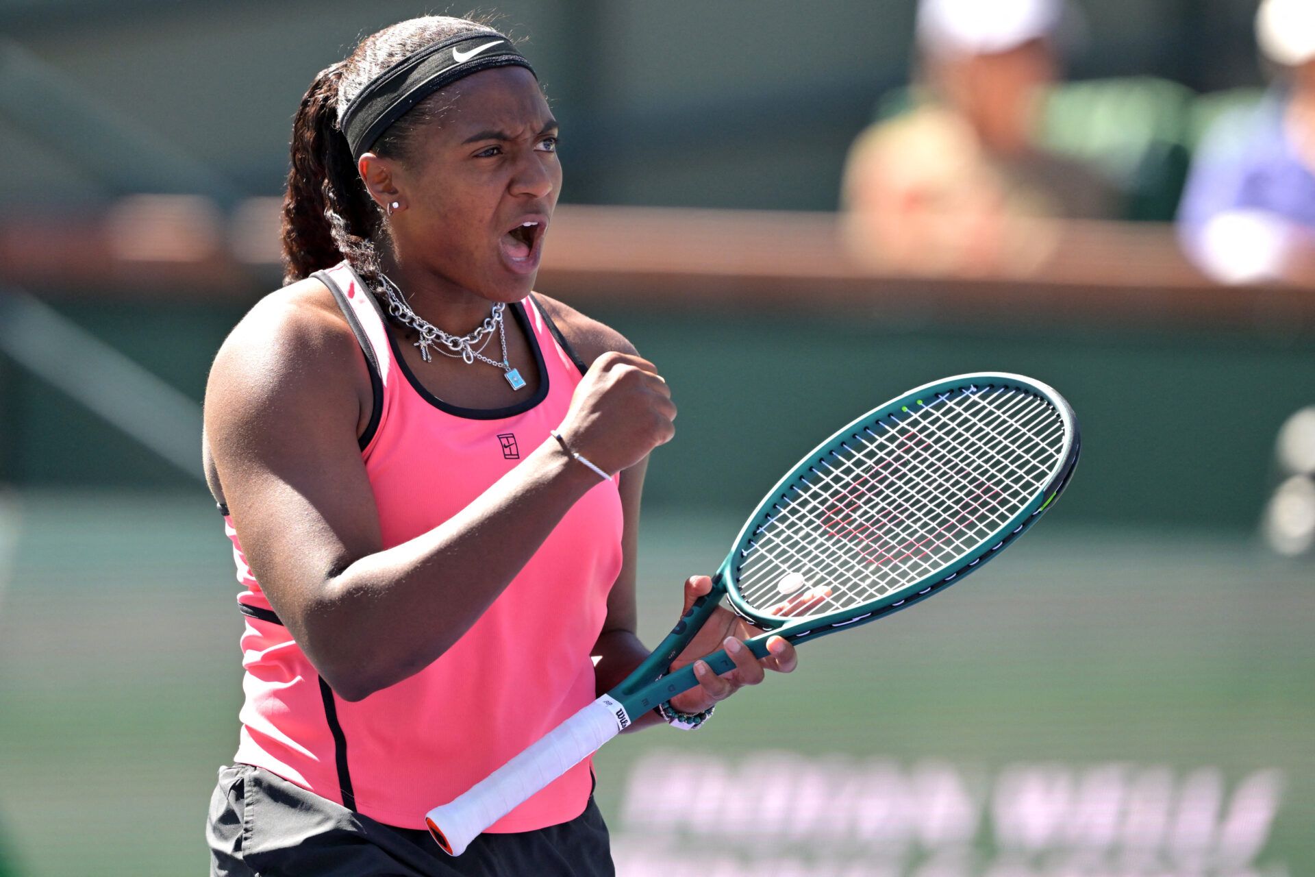 Hailey Baptiste (USA) reacts after winning the second set during her second round match against Elena Rybakina (KAZ) in the BNP Paribas Open at the Indian Wells Tennis Garden.