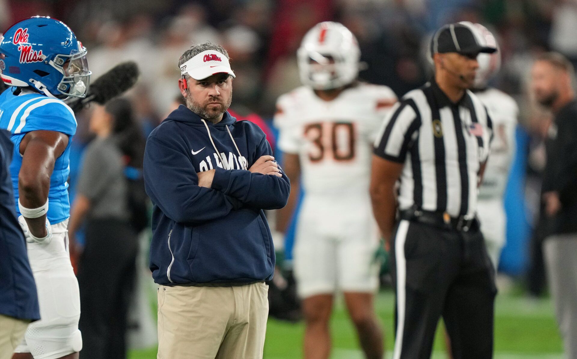 Ole Miss head coach Pete Golding stands on the field during warmups before the CFP Fiesta Bowl at the State Farm Stadium, in Glendale, Ariz., on Thursday, Jan. 8, 2026.