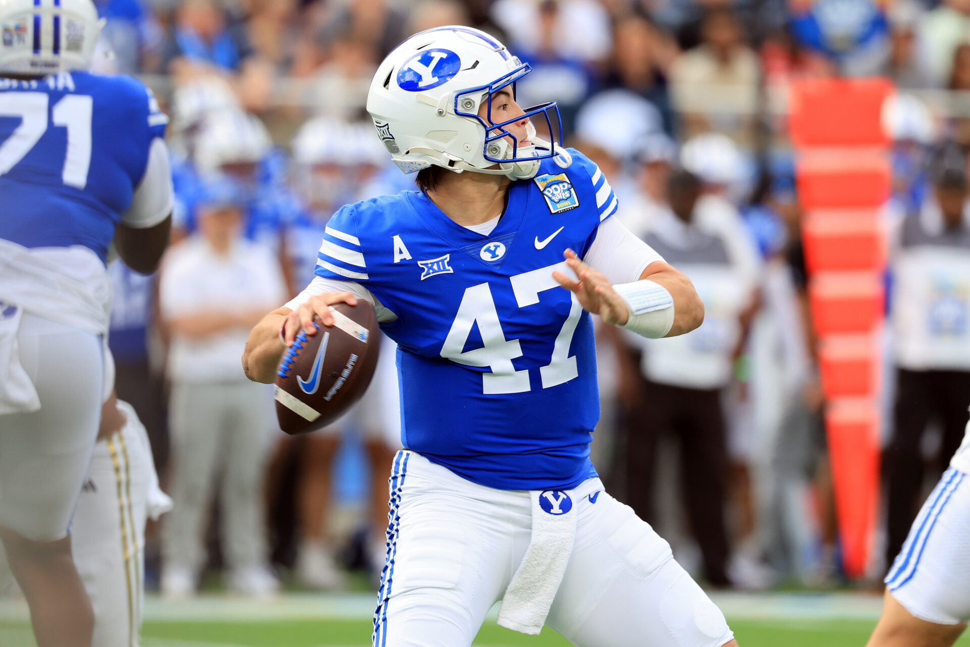 BYU Cougars quarterback Bear Bachmeier (47) throws the ball against the Georgia Tech Yellow Jackets during the first quarter at Camping World Stadium.