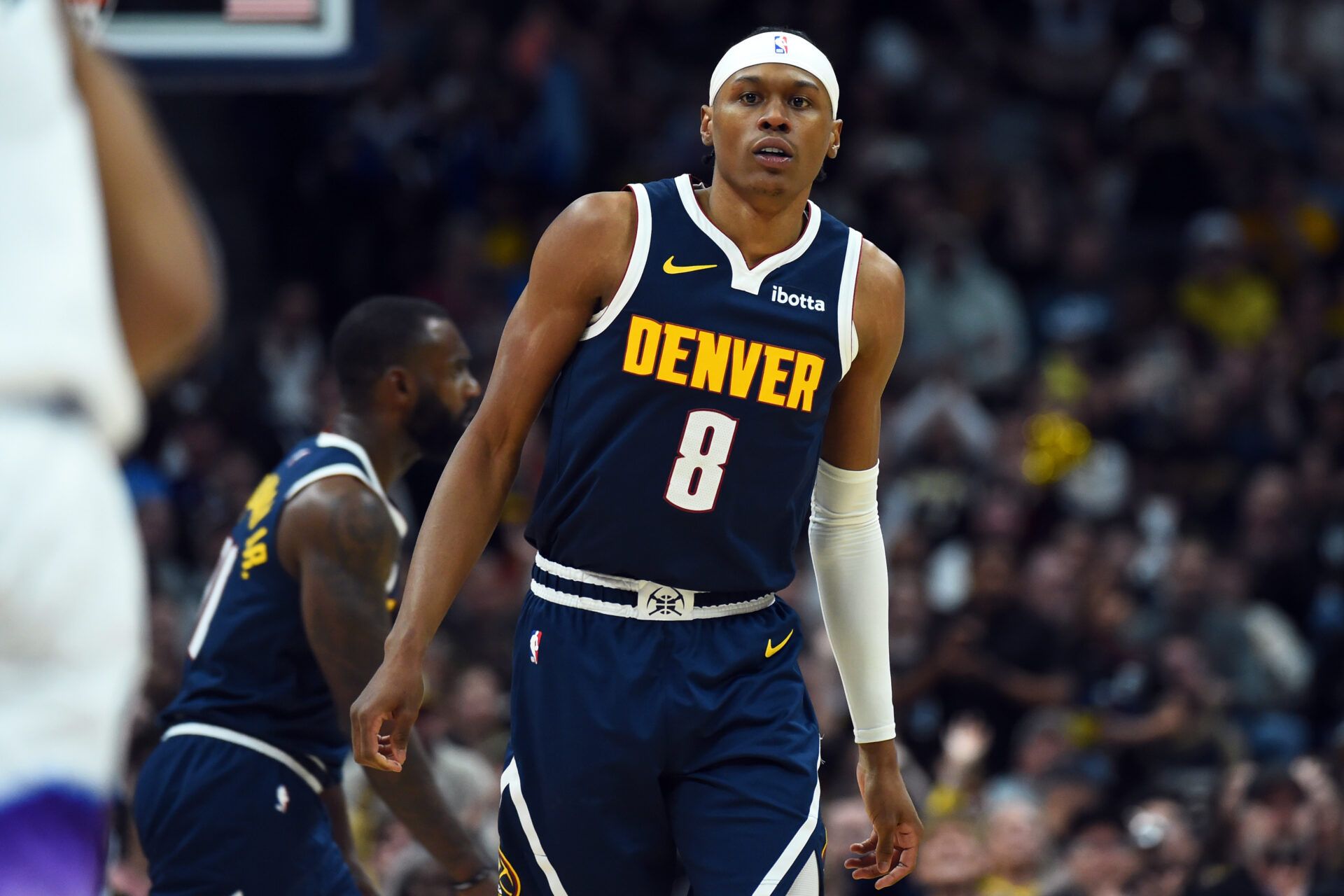 Denver Nuggets guard Peyton Watson (8) after making a basket during the second half against the Utah Jazz at Ball Arena.