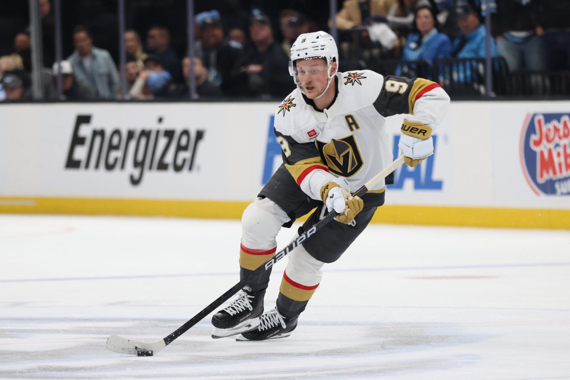 Vegas Golden Knights center Jack Eichel (9) plays the puck against the Utah Mammoth during overtime in game four of the first round of the 2026 Stanley Cup Playoffs at Delta Center.
