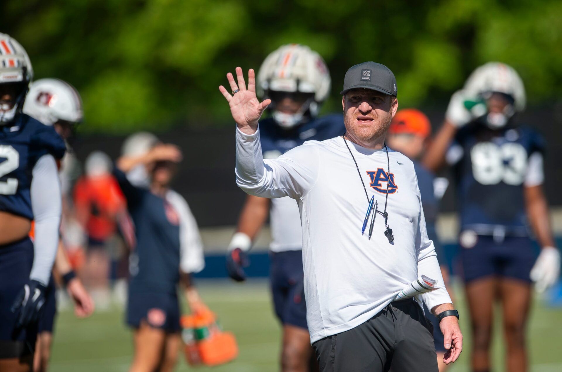 Auburn Tigers head coach Alex Golesh talks with his team during practice at Woltosz Football Performance Center in Auburn, Ala. on Thursday, April 16, 2026.