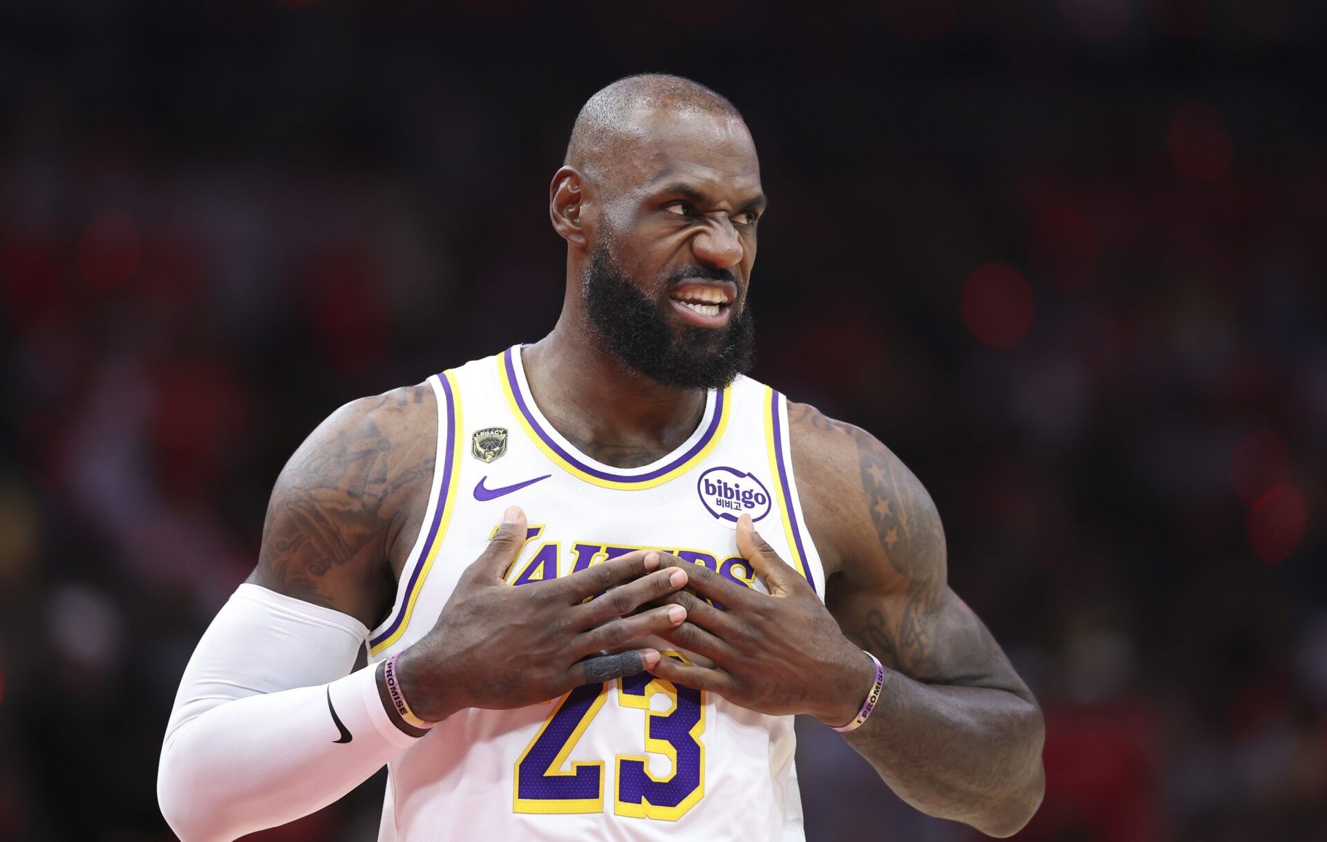 Los Angeles Lakers forward LeBron James (23) walks on the court before the start of the game against the Houston Rockets in game four of the first round of the 2026 NBA Playoffs at Toyota Center.
