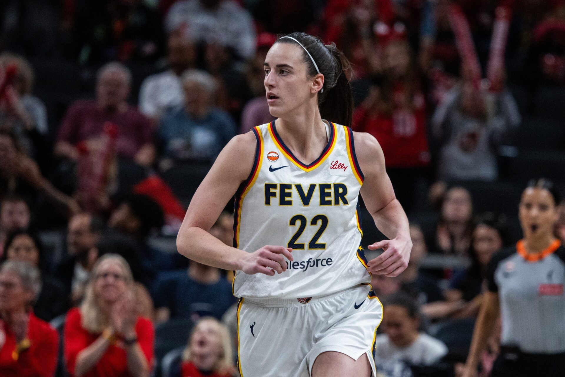 Indiana Fever guard Caitlin Clark (22) celebrates a made shot in the first half against the Dallas Wings