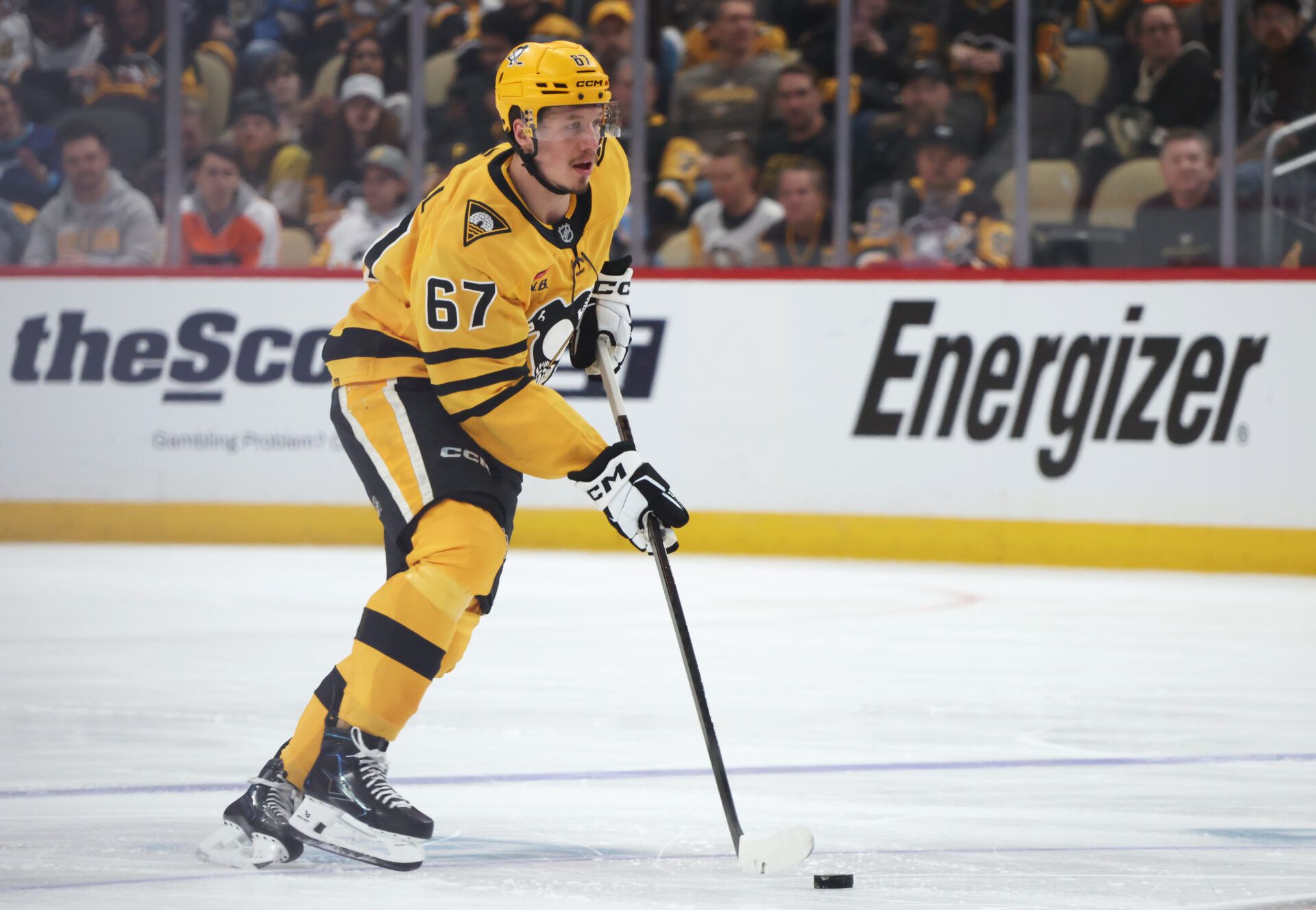 Pittsburgh Penguins right wing Rickard Rakell (67) skates with the puck against the Philadelphia Flyers during the third period in game two of the first round of the 2026 Stanley Cup Playoffs at PPG Paints Arena.