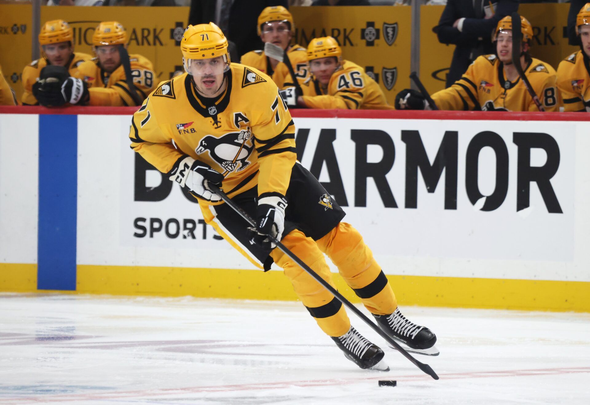 Pittsburgh Penguins center Evgeni Malkin (71) skates up ice with the puck against the Philadelphia Flyers during the third period in game five of the first round of the 2026 Stanley Cup Playoffs at PPG Paints Arena.