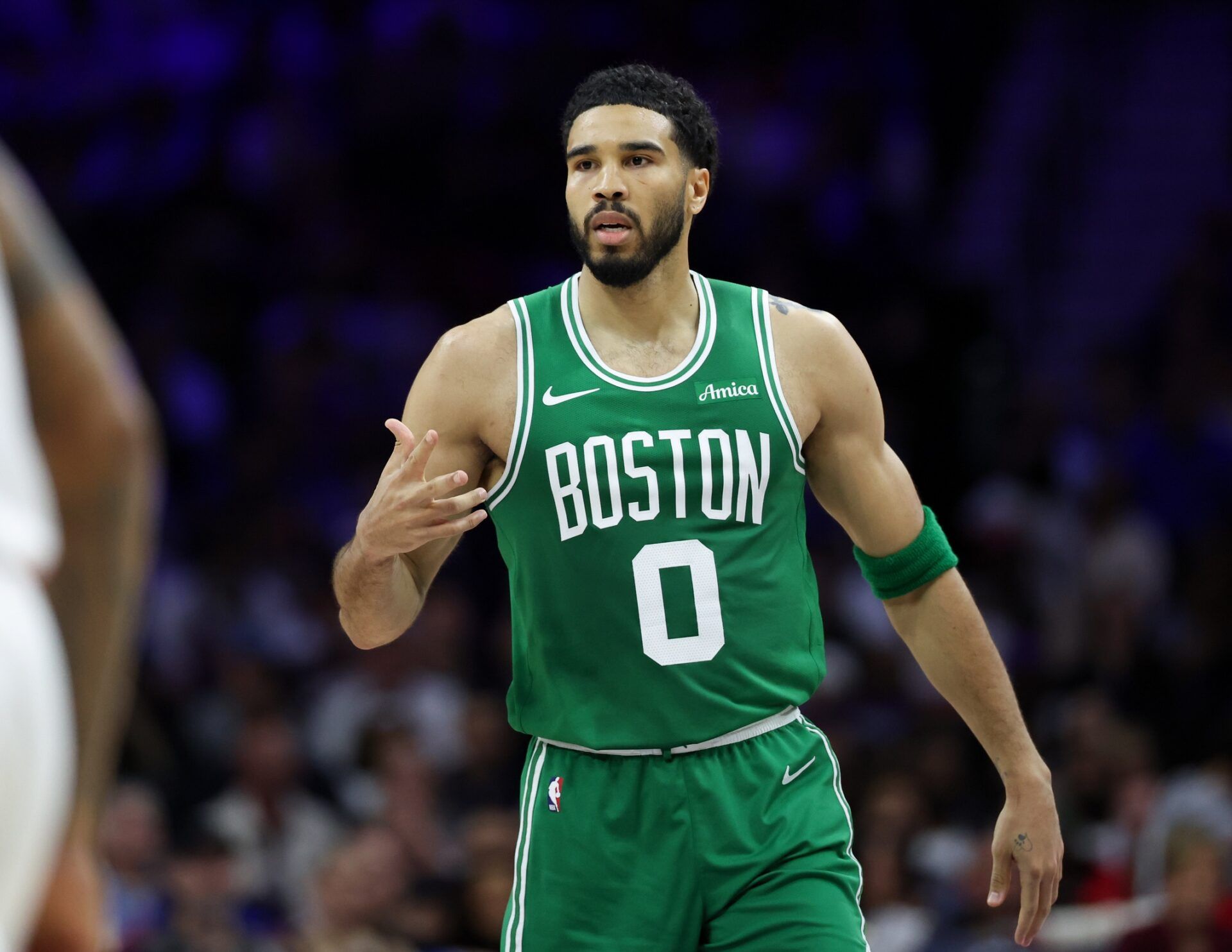 Boston Celtics forward Jayson Tatum (0) reacts to his score against the Philadelphia 76ers during the second quarter at Xfinity Mobile Arena.