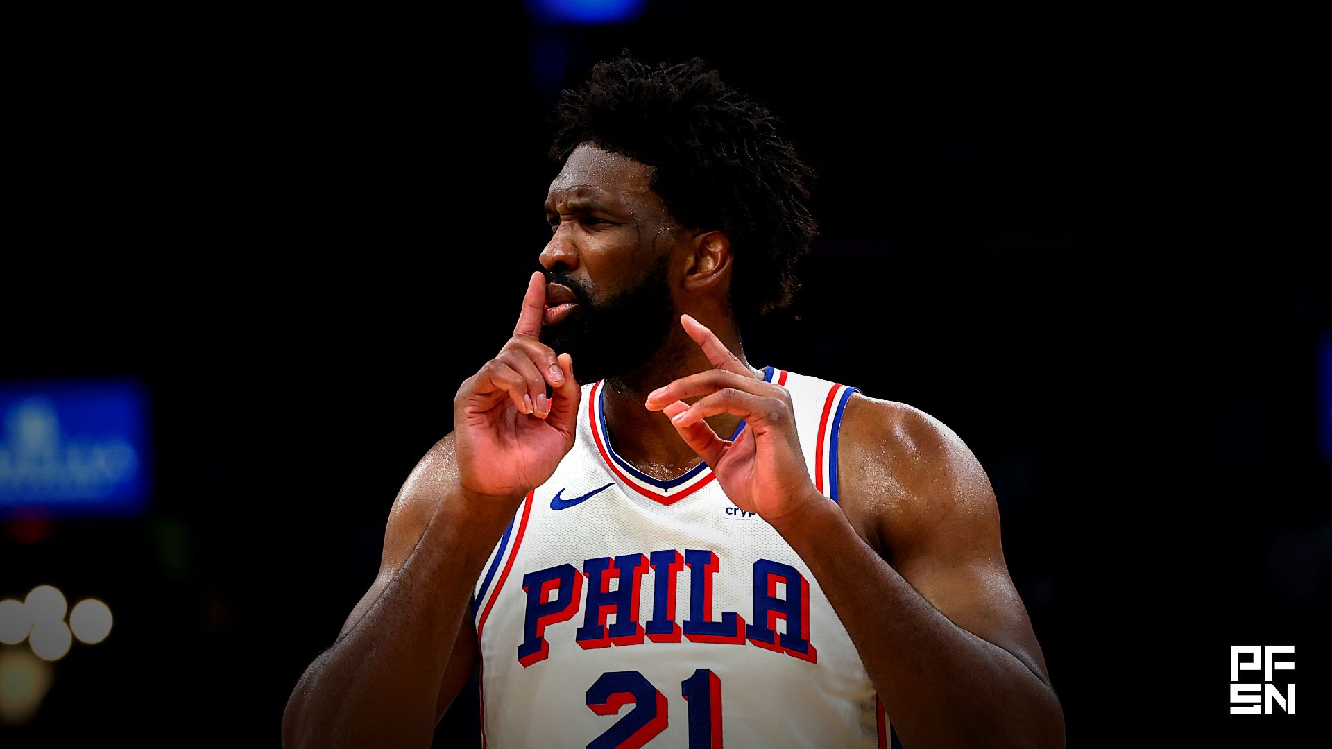 Philadelphia 76ers center Joel Embiid (21) silences the crowd after making a shot against the Boston Celtics during the second quarter of game seven of the first round of the 2026 NBA Playoffs at TD Garden.