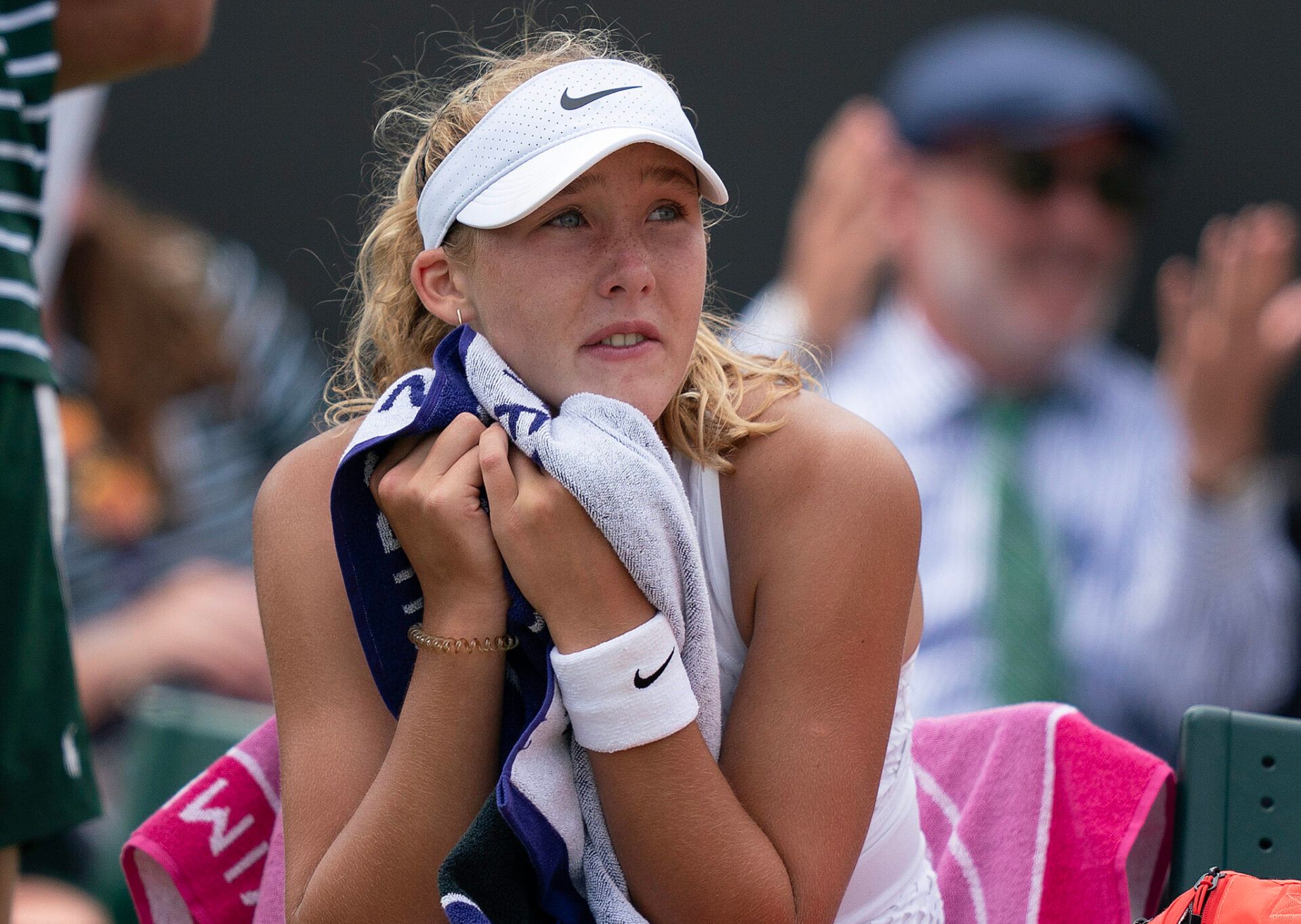 Mirra Andreeva reacts at a change of ends during a match against Madison Keys (USA) on day eight at the All England Lawn Tennis and Croquet Club.