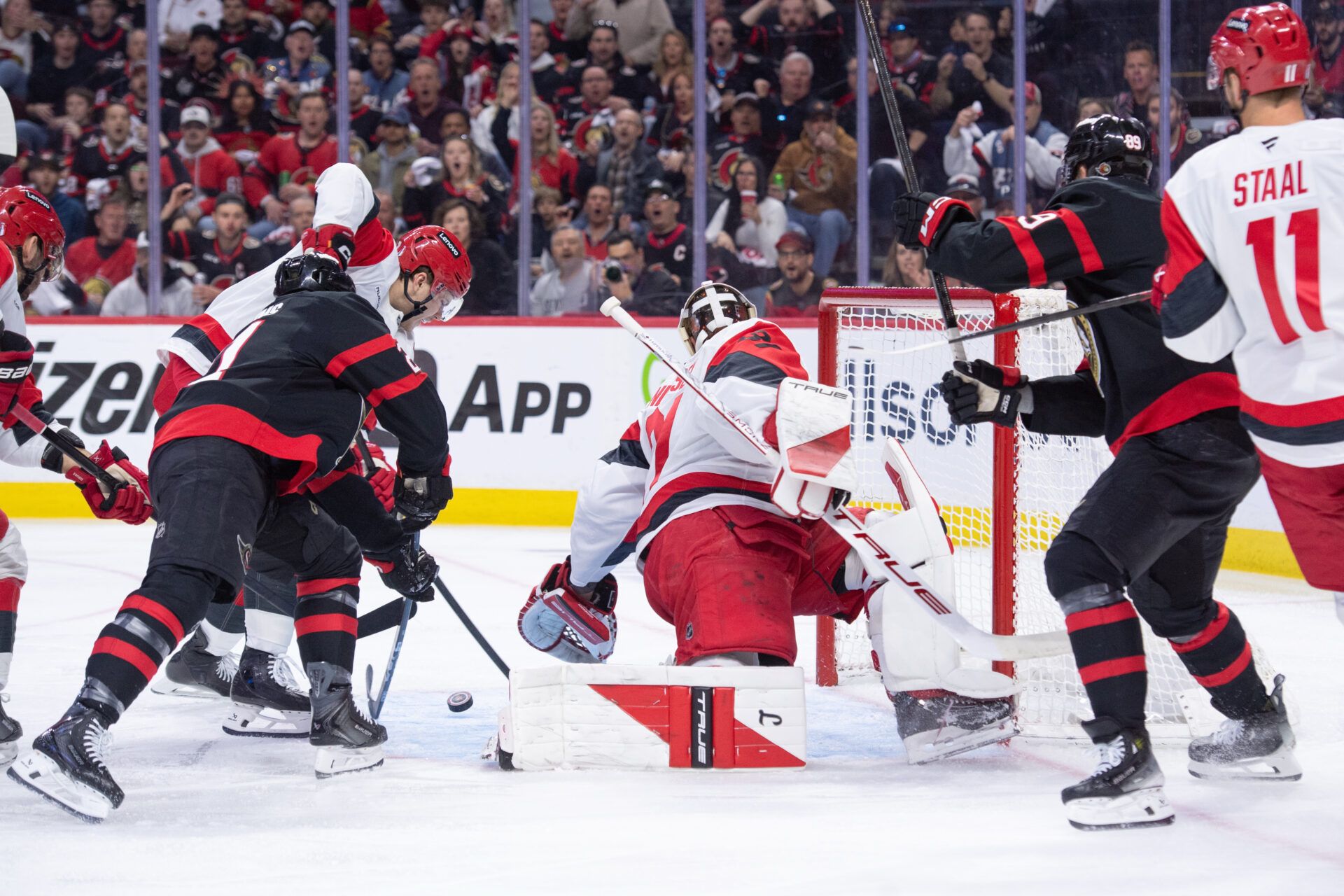 A shot from Ottawa Senators center Lars Eller (89) hits the crossbar in the first period against the Carolina Hurricanes in game four of the first round of the 2026 Stanley Cup Playoffs at the Canadian Tire Centre.