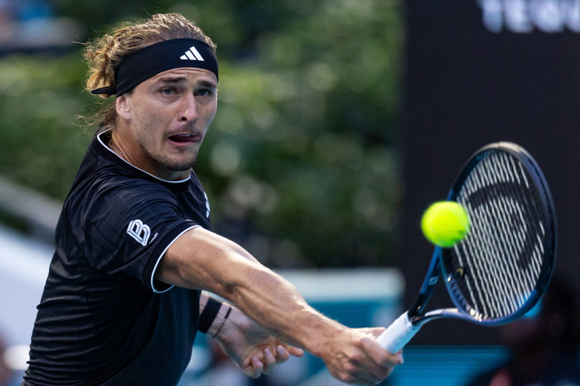 Alexander Zverev of Germany hits a backhand against Jannik Sinner of Italy in the semi-finals of the men’s singles at the Miami Open at the Hard Rock Stadium.