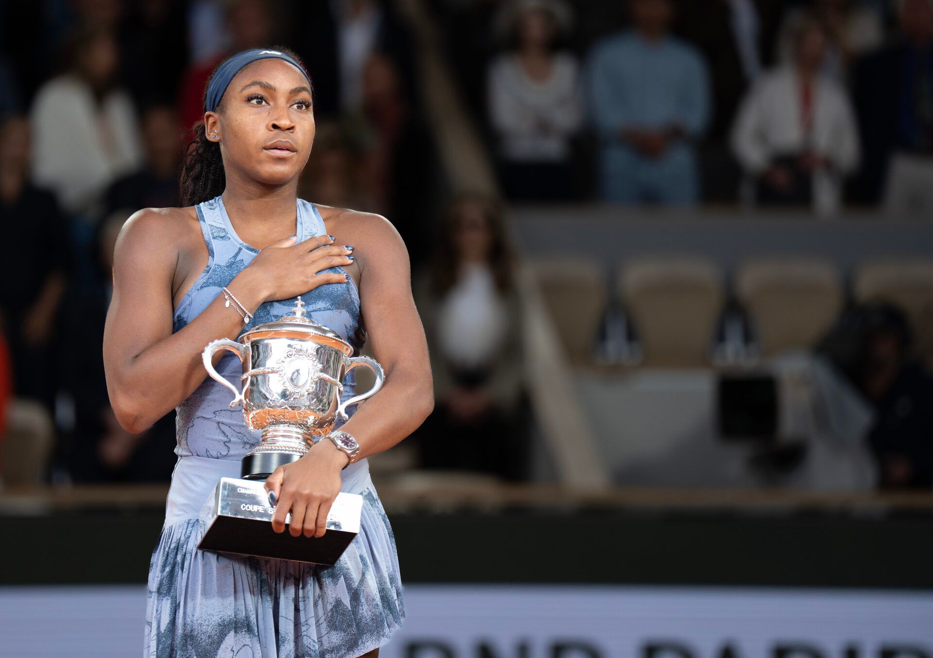 Coco Gauff of the United States poses with the trophy after winning the womenÕs singles final against Aryna Sabalenka on day 14 at Roland Garros Stadium.