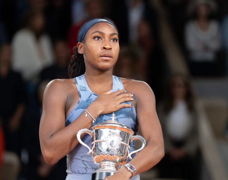 Coco Gauff of the United States poses with the trophy after winning the womenÕs singles final against Aryna Sabalenka on day 14 at Roland Garros Stadium.