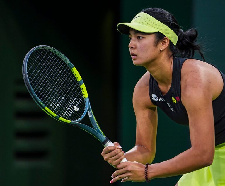 Alexandra Eala awaits a serve from Coco Gauff during their third-round match at the BNP Paribas Open in Indian Wells, Calif., Sunday, March 8, 2026.