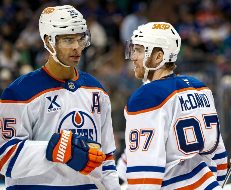 Edmonton Oilers defenseman Darnell Nurse (25) talks with center Connor McDavid (97) during the second period against the New York Rangers at Madison Square Garden.