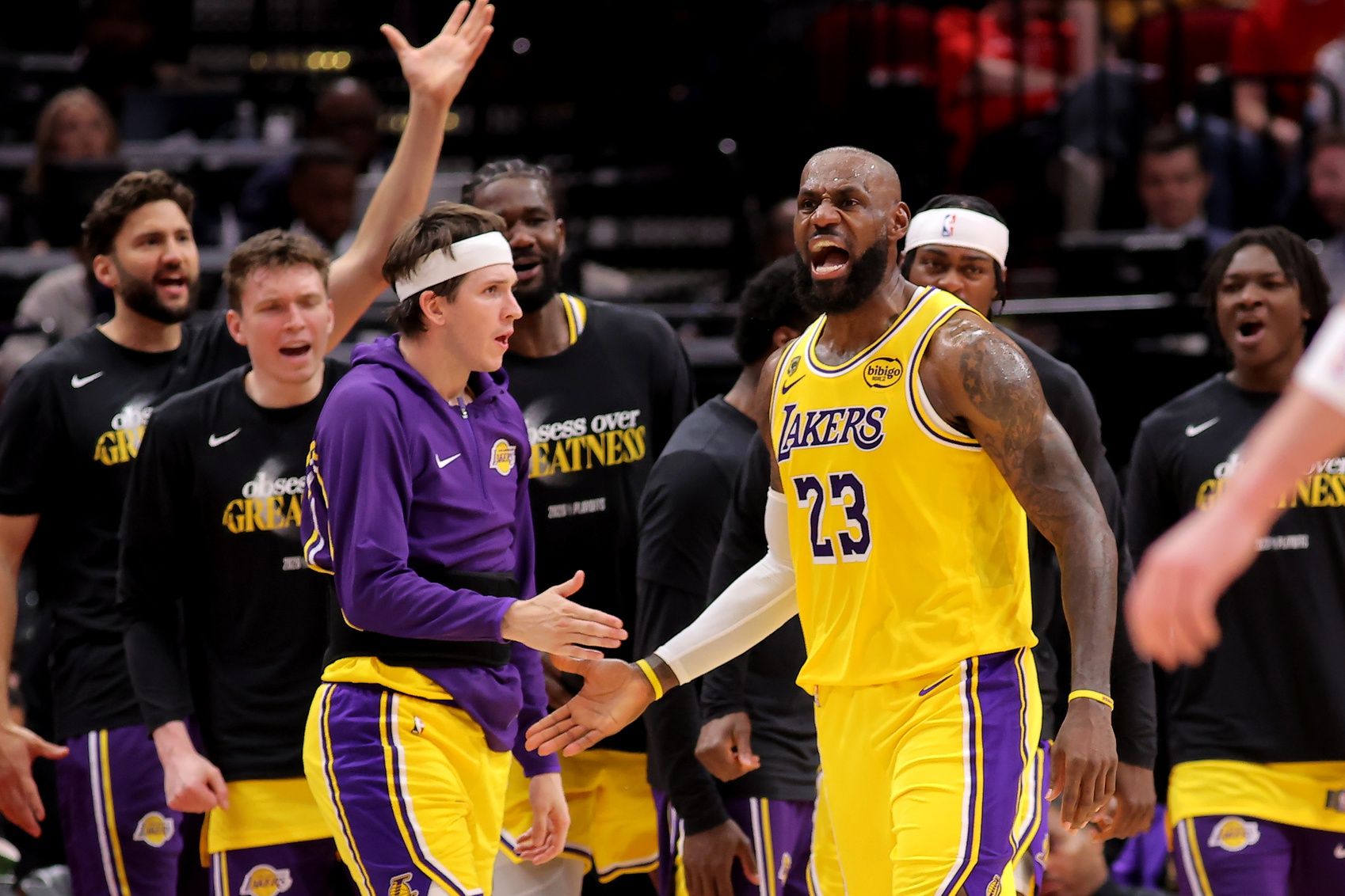 Los Angeles Lakers forward Lebron James (23) reacts after a made basket against the Houston Rockets during the second quarter of game six of the first round of the 2026 NBA Playoffs at Toyota Center.